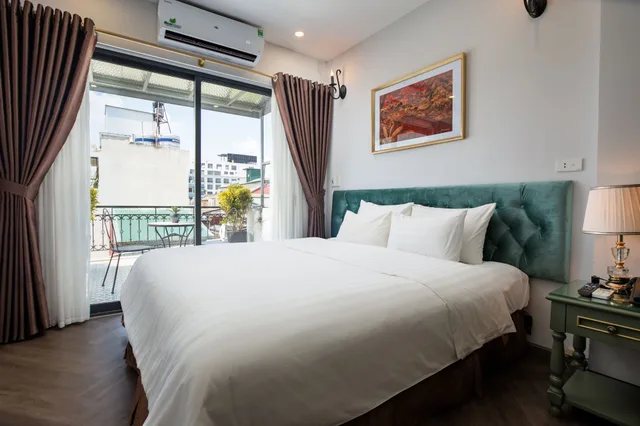 جناح جونيور بسرير كينج بإطلالة على المدينة بشرفة، Hanoi Gatsby Hotel 1/3