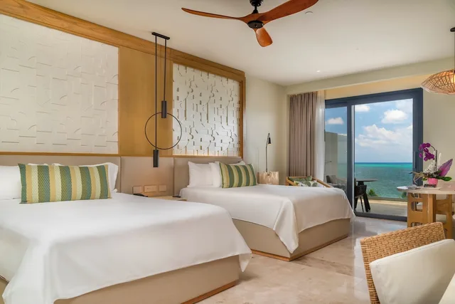 Serenity Club Junior Suite Partial Ocean View 2 Queen Beds، Haven Riviera Cancun Resort & Spa All Inclusive - Adults Only 1/2