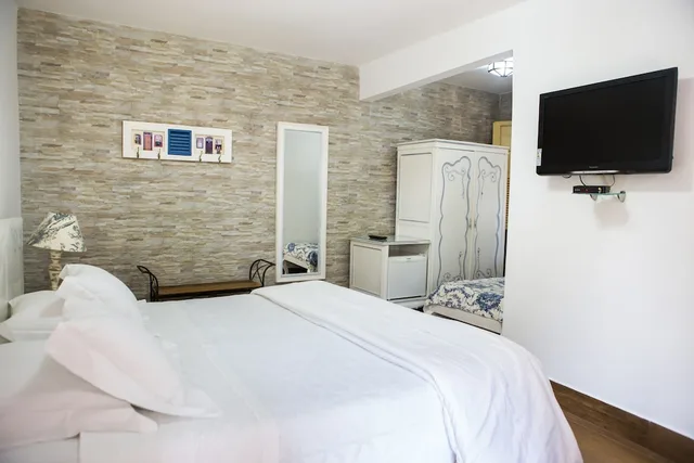 غرفة قياسية بثلاثة أسرّة، Villa Magnolia Pousada 4/5