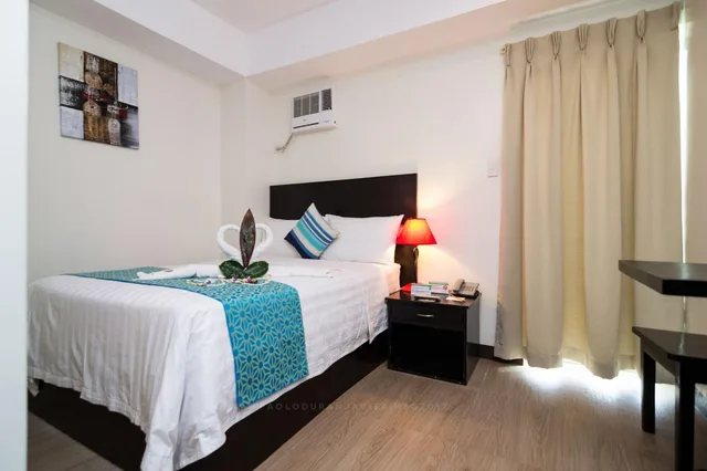 غرفة ديلوكس بسرير مزدوج، The Orient Beach Boracay 1/2