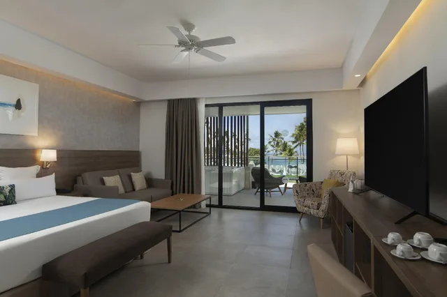 جناح بريميوم بسرير كينج مع أريكة، Serenade Punta Cana Beach & Spa Resort 1/1