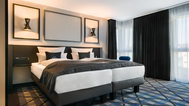 غرفة بريميوم بسرير كوين، Niu Square 3/5
