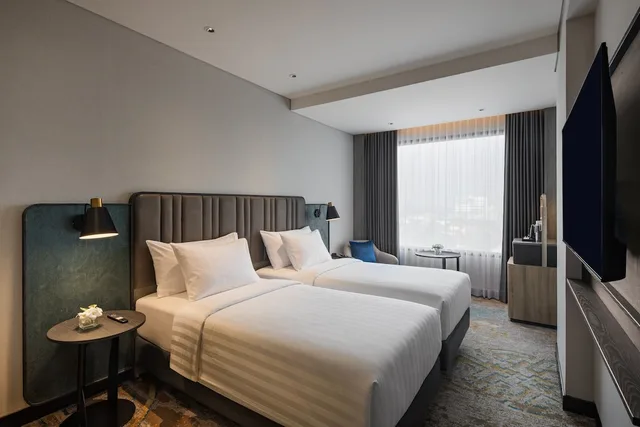 غرفة ديلوكس بسريرين منفصلين، Mercure Madiun 1/3