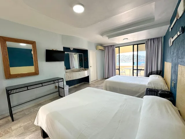 غرفة قياسية بسريرين مزدوجين بإطلالة على المسبح، Acamar Beach Resort Acapulco 1/4