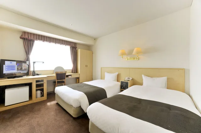 غرفة بسريرين منفصلين للمدخنين، Yamagata Kokusai Hotel 1/2
