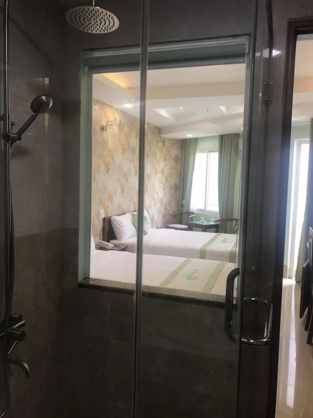 غرفة ديلوكس رباعية بسريرين مزدوجين بإطلالة على المتنزه، Green Park Hotel Quy Nhon 7/7