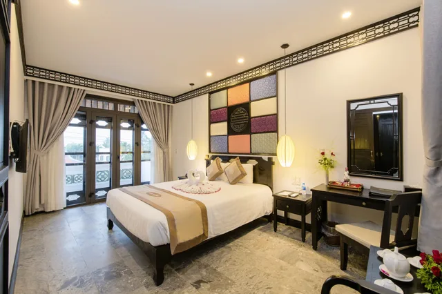 غرفة عائلية بسريرين منفصلين وسرير كينج بإطلالة على المدينة، Hoi An Coco River Resort Spa 4/10