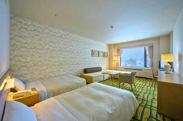غرفة قياسية بسريرين منفصلين مع أريكة، HOTEL TANGRAM 1/4