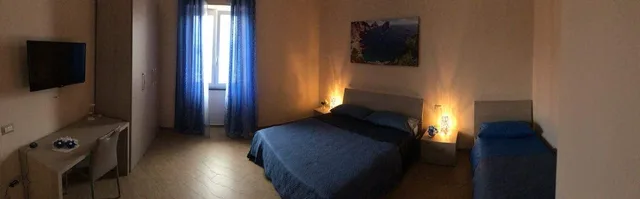 غرفة ثلاثية بسرير كوين وسرير فردي، Le Tre Gemme 3/4