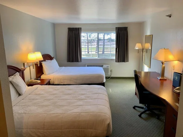 Deluxe, Studio, Queen Bed, Crossings by GrandStay Inn & Suites 1/2