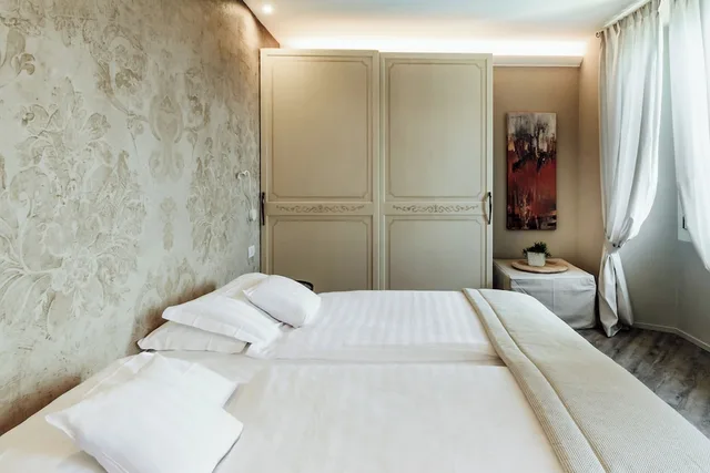 غرفة ديلوكس بسرير مزدوج بإطلالة على البحيرة، Relais Villa Porta 8/10