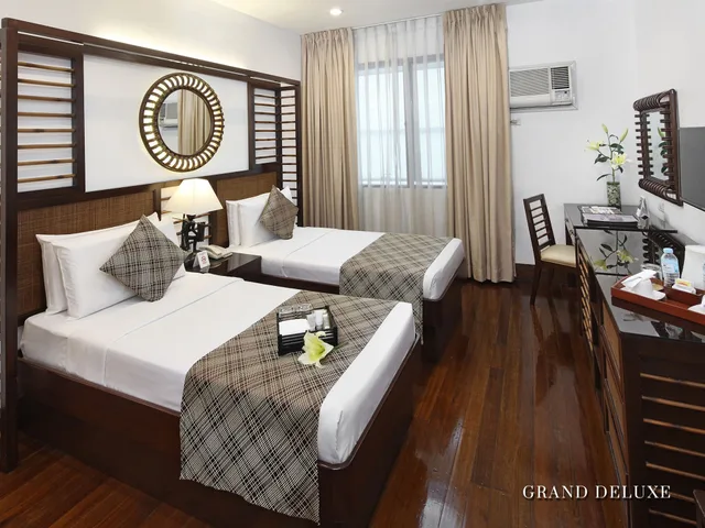 غرفة غراند ديلوكس بسرير مزدوج، Manila Lotus Hotel 1/1