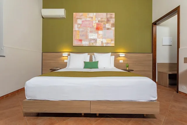 غرفة كلاسيكية بسرير كينج بإطلالة على الحديقة، Feudogrande Agriturismo 3/6