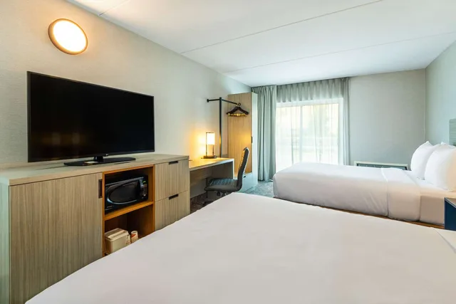 Upgrade, 2 Double Beds، Comfort Inn Kingston - Highway 401 4/6