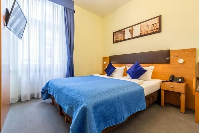 غرفة قياسية ثلاثية بسريرين منفصلين مع أريكة، Hotel Expo 1/5