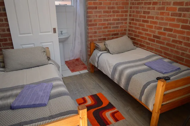 غرفة اقتصادية بسريرين منفصلين، Village Lodge Harrismith 1/2
