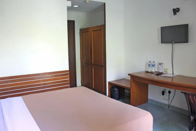 غرفة بسرير مزدوج بشرفة، Hotel Winotosastro Garden 5/8