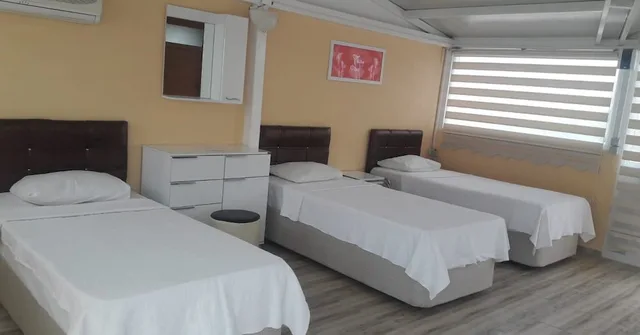 غرفة ديلوكس ثلاثية مع أريكة، Melodi Club Hotel 1/1