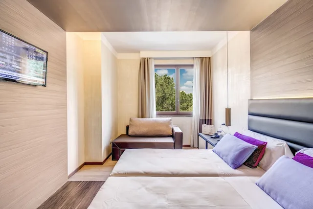 غرفة سوبيريور ثلاثية بسرير مزدوج مع أريكة، Warmthotel 1/10