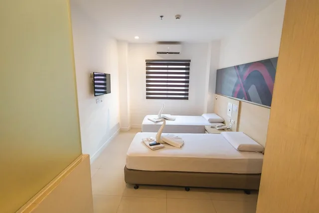 غرفة أساسية بسريرين منفصلين، Wow Budget Hotel Cubao 1/2
