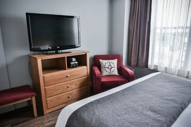 جناح بسرير كوين مع أريكة، Cambridge Hotel Conference Centre 2/2