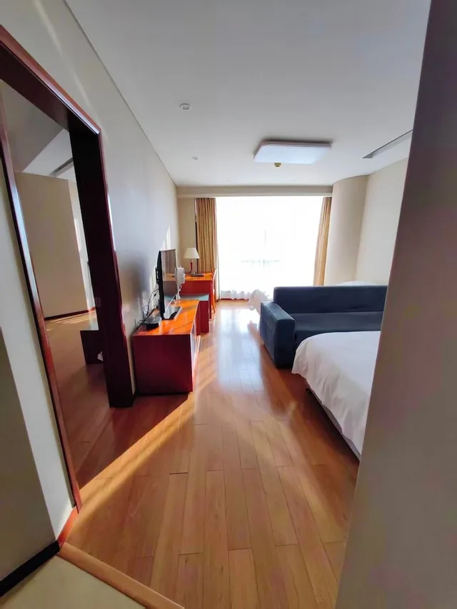 جناح عائلي بسرير كينج وسرير فردي، East King Business Hotel 3/9