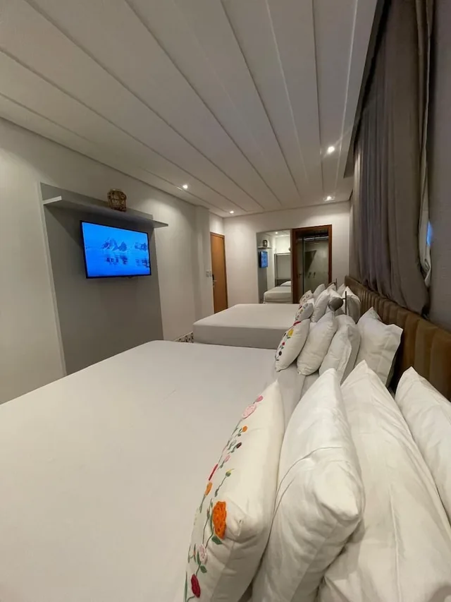 غرفة ديلوكس رباعية بسريرين كينج، Hotel Estilo de Minas 2/6