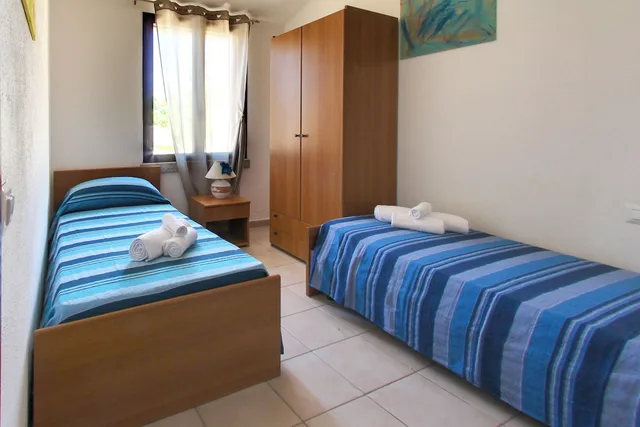 شقة بسريرين منفصلين بغرفتي نوم مع أريكة، Residence Oasi Anfiteatro 2/5