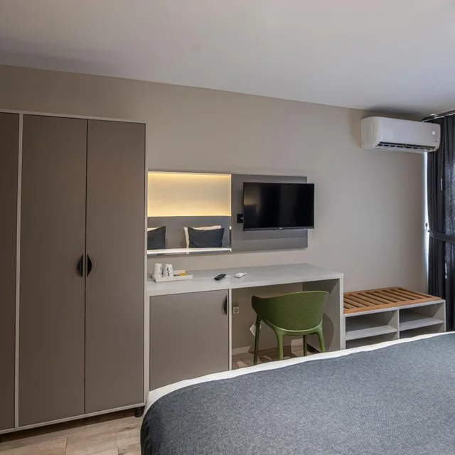غرفة ديلوكس بسرير مزدوج أو سريرين منفصلين بإطلالة على الحديقة، Calanthe Residence 8/10