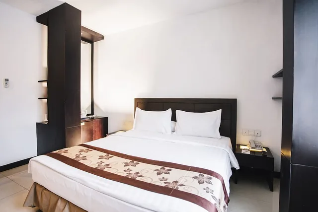 غرفة عصرية ديلوكس بسريرين منفصلين، Grand TW Batam Center Hotel & Convention 1/8