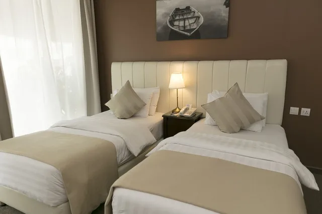 غرفة ديلوكس بسريرين كينج بغرفة نوم واحدة بحمام خاص، THE CONROY BOUTIQUE HOTEL 1/6