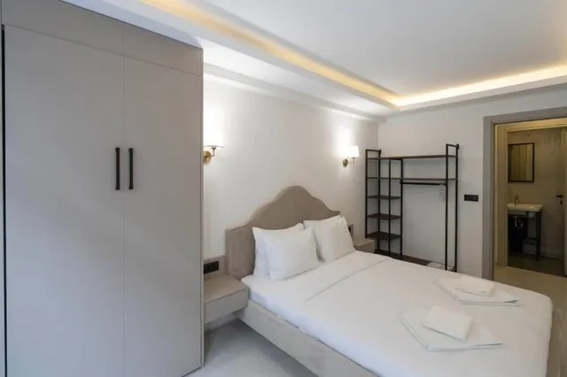 شقة عائلية بسرير كوين وسرير فردي مع أريكة، Arach Hotel Harbiye 1/5