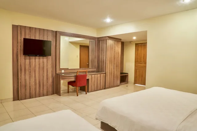 غرفة عائلية بسرير كينج وسرير فردي، Hotel Alia Boutique Pasar Baru 2/3