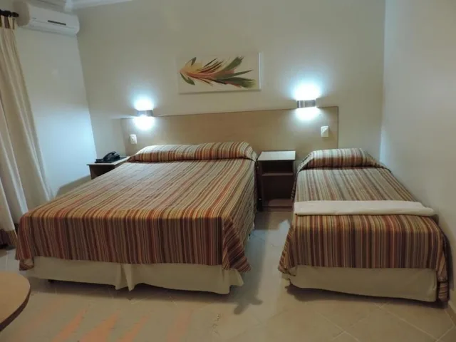 غرفة ديلوكس ثلاثية بسرير مزدوج وسرير فردي، Hotel Costa Balena 3/8