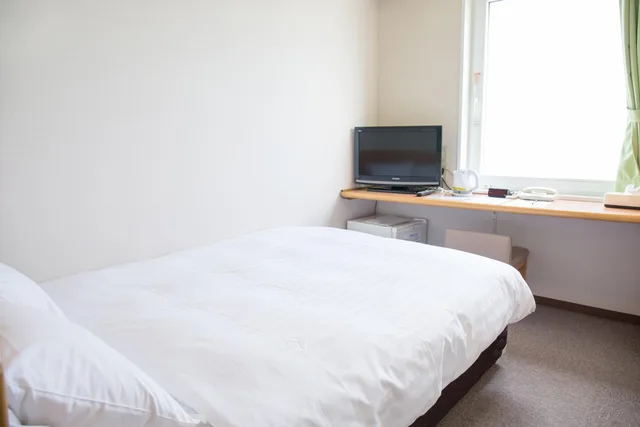 غرفة بسرير مزدوج بإطلالة على البحر بحمام مشترك، Kur & Hotel Suruga 1/1