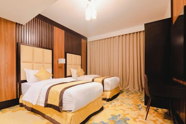 غرفة عائلية رباعية بأربعة أسرّة، فندق السفينة الذهبية(Golden Ship Hotel) 2/3