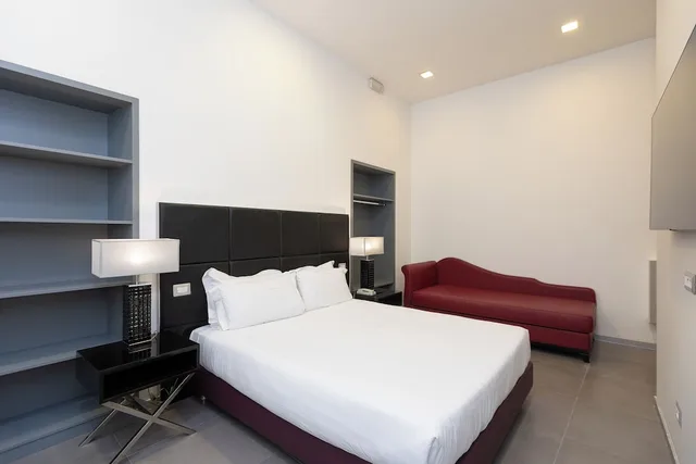 جناح عائلي بسرير كينج وسريرين منفصلين، Hotel Castellino Roma 1/10