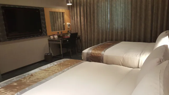 غرفة إليت رباعية بسريرين مزدوجين، Kai Shen Sinsu Hotel 1/3