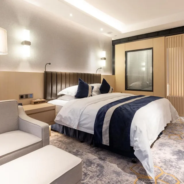 غرفة ديلوكس بسرير كينج بإطلالة على المدينة للمدخنين، Grand Metropark Hotel Liyuan Chongqing 1/8
