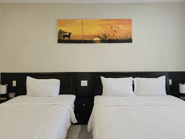 غرفة ثلاثية بسرير مزدوج وسرير فردي بشرفة، Flamingo Villa Hoi An 7/10