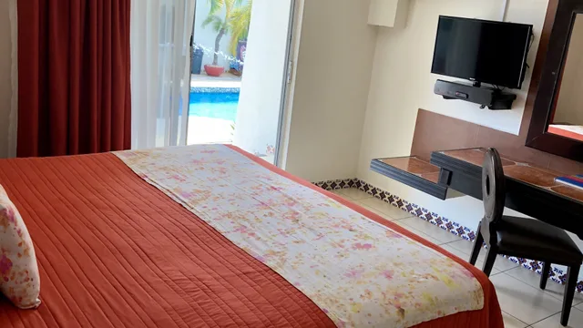 غرفة جونيور بسرير كينج وسريرين مزدوجين بغرفتي نوم، VF Villa Florencia Hotel 3/6