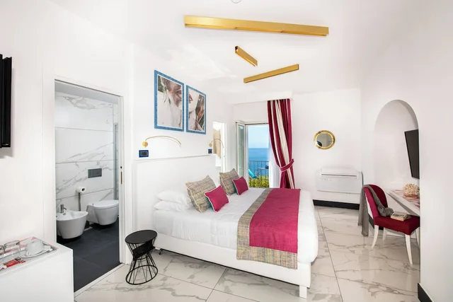 غرفة تنفيذية بسريرين منفصلين بإطلالة على البحر مع أريكة بحوض جاكوزي، Positano Art Hotel Pasitea 6/10