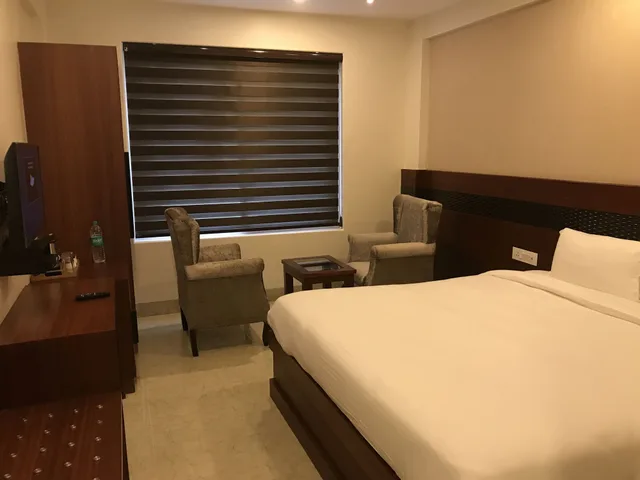 غرفة ديلوكس بسريرين منفصلين وسرير كينج بإطلالة على الجبل والمدينة، Holy River Hotel 2/5
