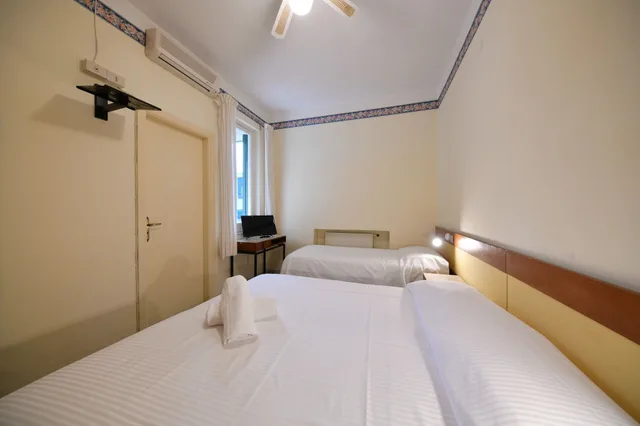 غرفة اقتصادية ثلاثية بسرير مزدوج وسرير فردي، Hotel Villa Diana 1/6