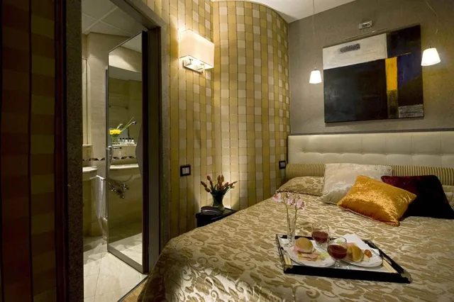 غرفة صغيرة بسرير مزدوج أو سريرين منفصلين، Duca D Alba Hotel 1/2