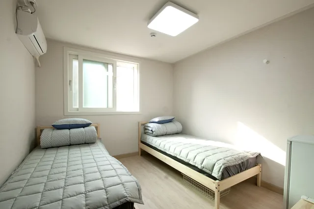 غرفة ديلوكس بسرير مزدوج وسرير فردي بحمام خاص، Twin Rabbit Guesthouse 1/7