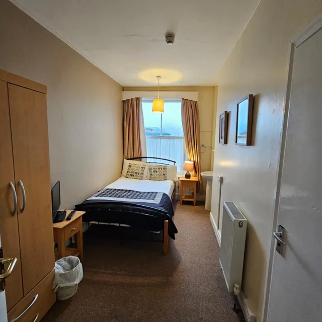غرفة مفردة، Rivelyn Hotel 7/8