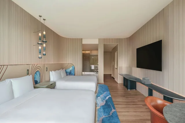 Guest Room, Deluxe, 2 Queen Beds, Island View، W Singapore Sentosa Cove 1/2