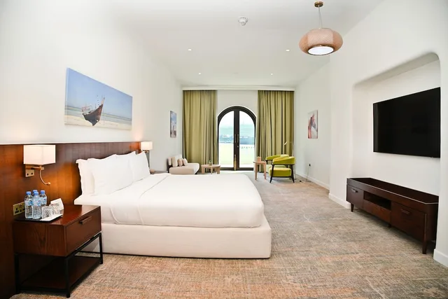 غرفة ديلوكس بسرير كينج، Mina Hotel and Residences 2/6