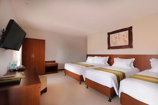 غرفة عائلية بسرير مزدوج وسريرين منفصلين، Adi Dharma Hotel Legian 1/3